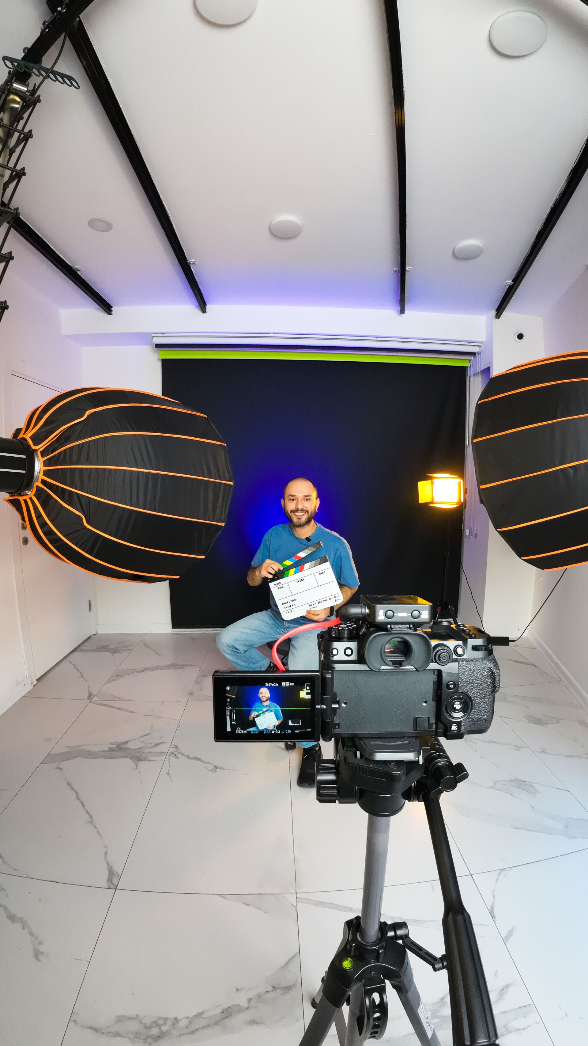 Content creator records new interview video with film slate